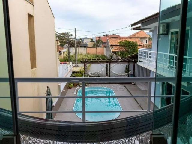 Casa / Sobrado para Venda em Navegantes/SC Meia Praia 4 Quartos