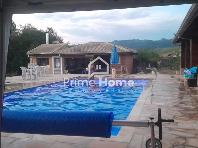 Casa / Sobrado para Venda em Ouro Fino/MG Centro 4 Quartos