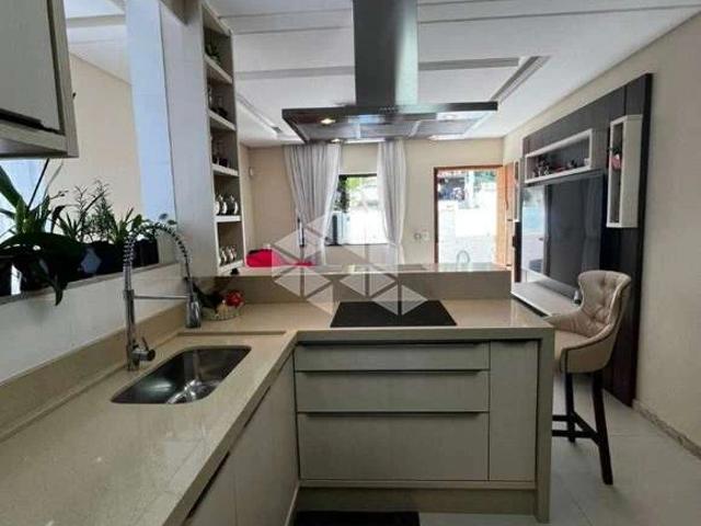 Casa / Sobrado para Venda em Palhoça/SC Aririu 3 Quartos