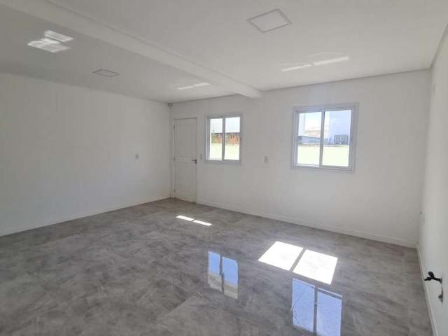 Casa / Sobrado para Venda em Palhoça/SC Aririu 3 Quartos