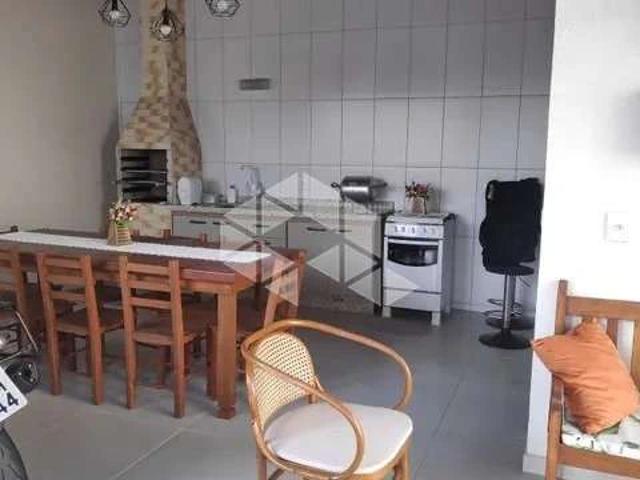 Casa / Sobrado para Venda em Palhoça/SC Aririu 3 Quartos