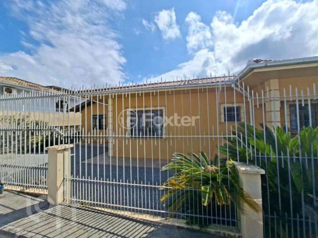 Casa / Sobrado para Venda em Palhoça/SC Aririu 3 Quartos