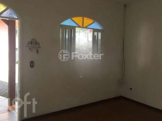 Casa / Sobrado para Venda em Palhoça/SC Aririu 3 Quartos