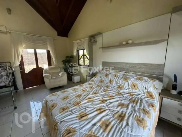 Casa / Sobrado para Venda em Palhoça/SC Aririu 4 Quartos