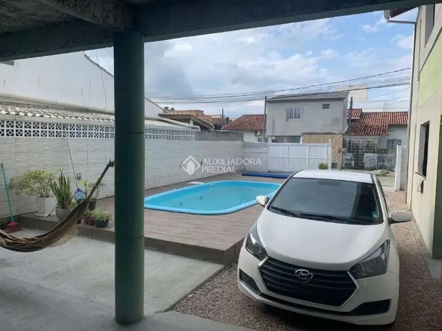 Casa / Sobrado para Venda em Palhoça/SC Barra do Aririú 3 Quartos