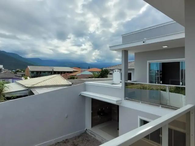 Casa / Sobrado para Venda em Palhoça/SC Barra do Aririú 3 Quartos