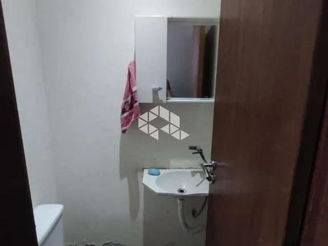 Casa / Sobrado para Venda em Palhoça/SC Barra do Aririú 3 Quartos