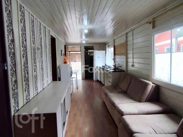 Casa / Sobrado para Venda em Palhoça/SC Enseada de Brito 3 Quartos