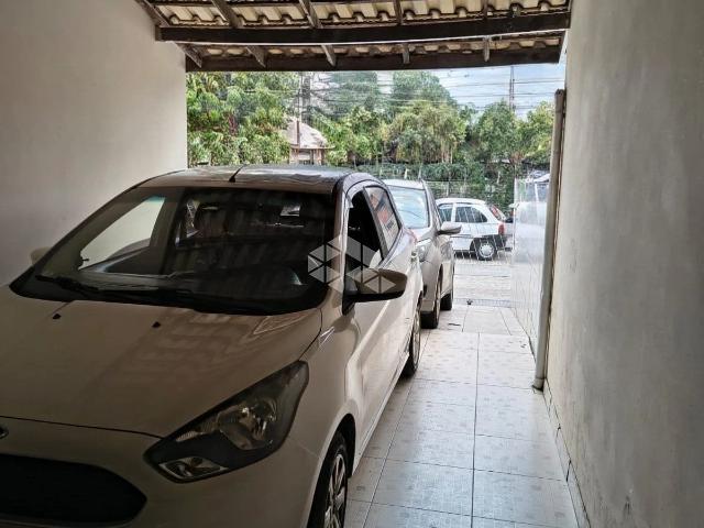 Casa / Sobrado para Venda em Palhoça/SC Madri 4 Quartos