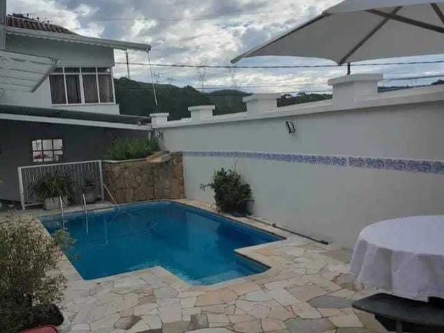 Casa / Sobrado para Venda em Poços de Caldas/MG Vila Togni 3 Quartos
