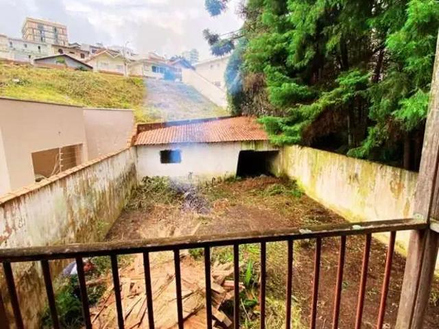 Casa / Sobrado para Venda em Poços de Caldas/MG Jardim Quisisana 3 Quartos