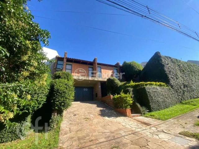 Casa / Sobrado para Venda em Porto Alegre/RS Três Figueiras 4 Quartos