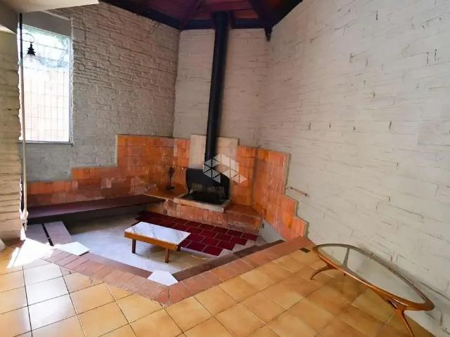 Casa / Sobrado para Venda em Porto Alegre/RS Três Figueiras 4 Quartos