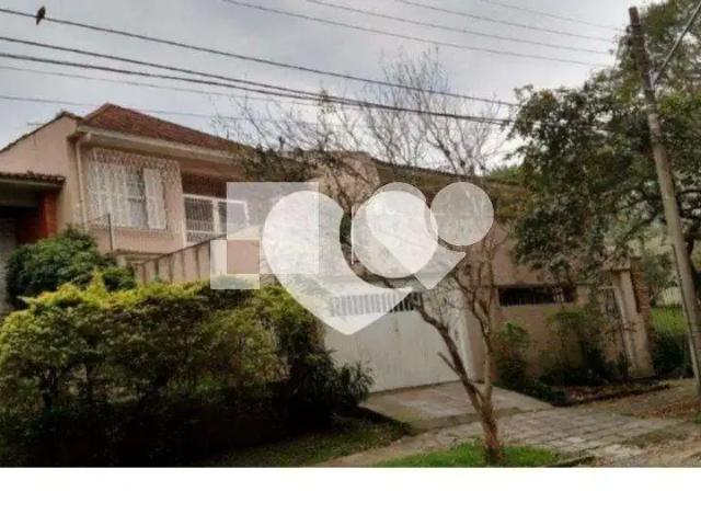 Casa / Sobrado para Venda em Porto Alegre/RS Três Figueiras 4 Quartos