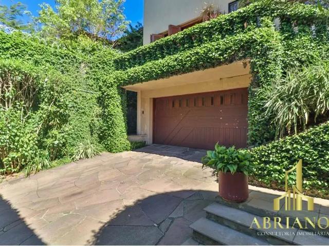 Casa / Sobrado para Venda em Porto Alegre/RS Três Figueiras 4 Quartos