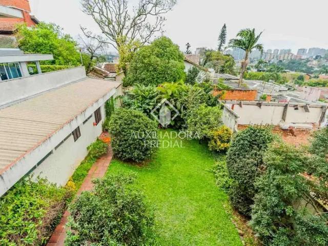 Casa / Sobrado para Venda em Porto Alegre/RS Três Figueiras 4 Quartos