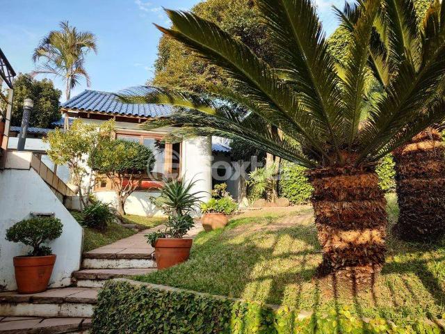 Casa / Sobrado para Venda em Porto Alegre/RS Três Figueiras 5 Quartos