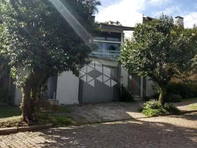 Casa / Sobrado para Venda em Porto Alegre/RS Três Figueiras 3 Quartos
