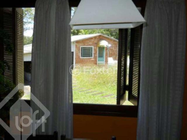 Casa / Sobrado para Venda em Porto Alegre/RS Vila Nova 3 Quartos