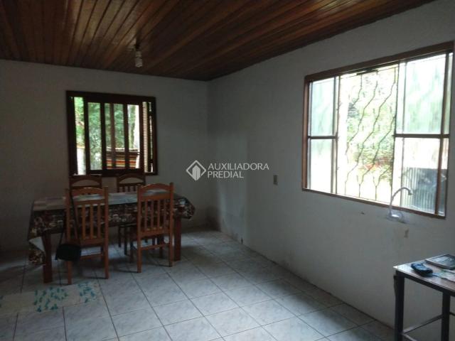 Casa / Sobrado para Venda em Porto Alegre/RS Vila Nova 3 Quartos
