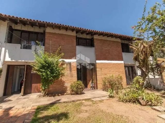 Casa / Sobrado para Venda em Porto Alegre/RS Vila Nova 3 Quartos