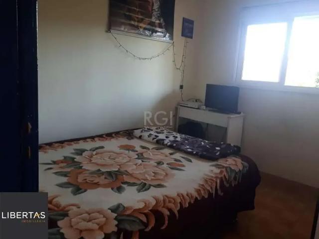 Casa / Sobrado para Venda em Porto Alegre/RS Vila Nova 3 Quartos