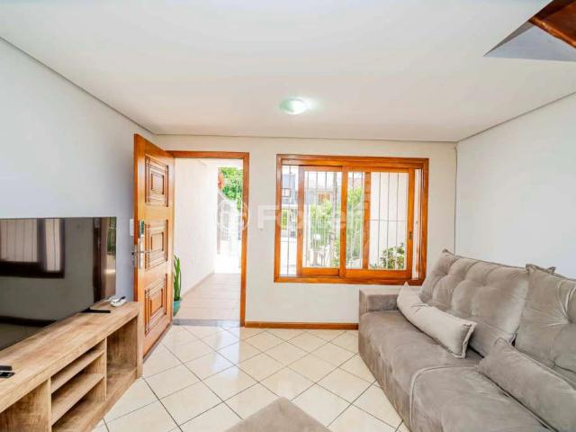 Casa / Sobrado para Venda em Porto Alegre/RS Vila Nova 3 Quartos