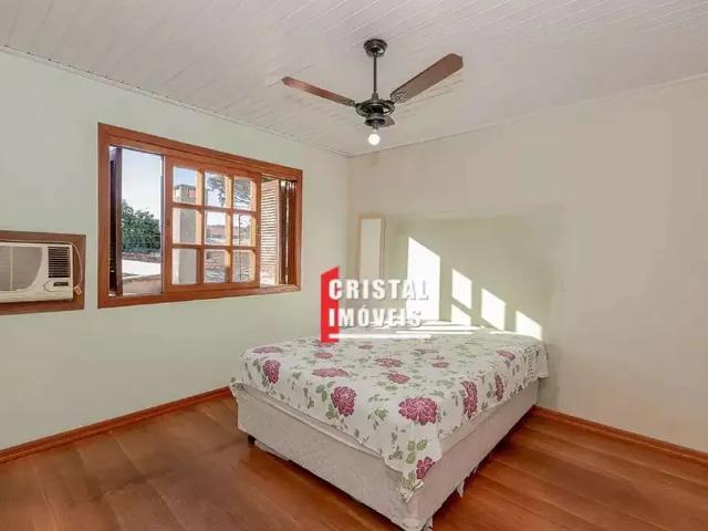 Casa / Sobrado para Venda em Porto Alegre/RS Vila Nova 4 Quartos