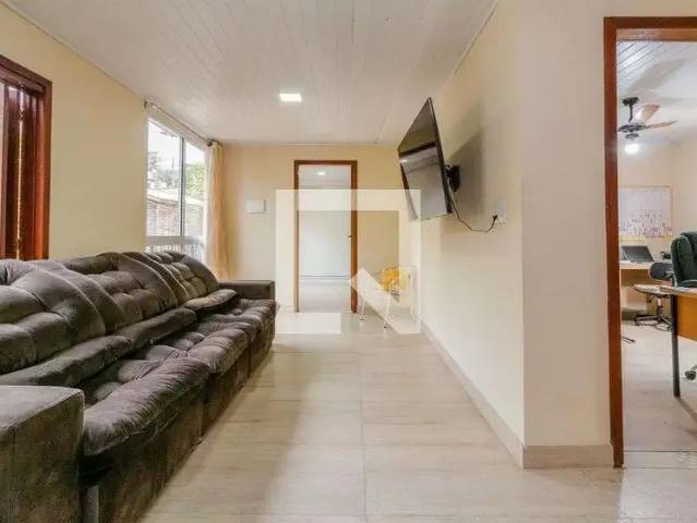 Casa / Sobrado para Venda em Porto Alegre/RS Vila Nova 4 Quartos