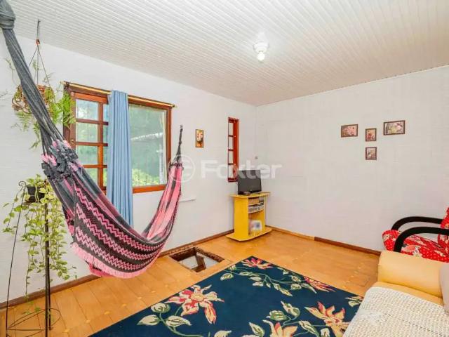 Casa / Sobrado para Venda em Porto Alegre/RS Vila Nova 4 Quartos