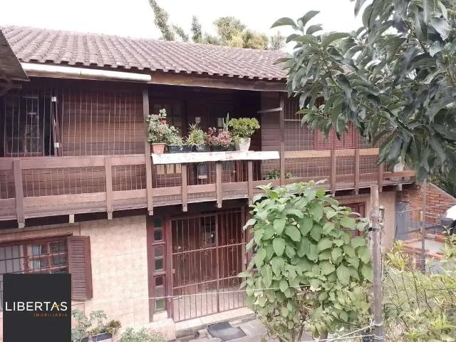 Casa / Sobrado para Venda em Porto Alegre/RS Vila Nova 4 Quartos