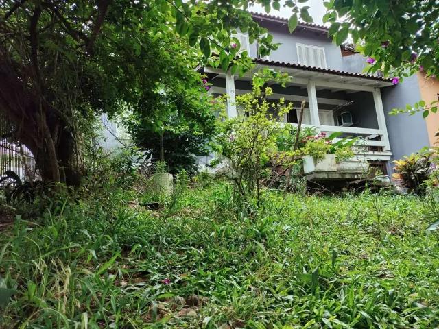 Casa / Sobrado para Venda em Porto Alegre/RS Vila Nova 5 Quartos