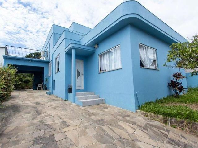 Casa / Sobrado para Venda em Porto Alegre/RS Vila Nova 5 Quartos