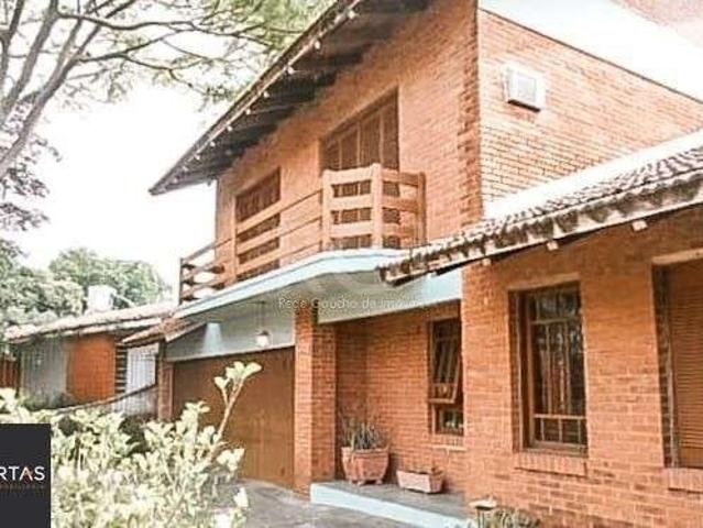 Casa / Sobrado para Venda em Porto Alegre/RS Vila Assunção 4 Quartos