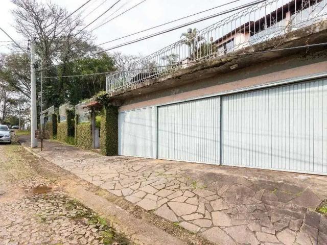 Casa / Sobrado para Venda em Porto Alegre/RS Vila Conceição 4 Quartos