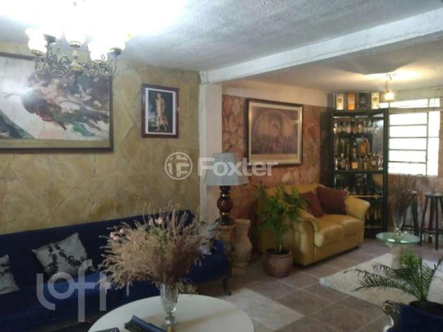 Casa / Sobrado para Venda em Porto Alegre/RS Vila Jardim 4 Quartos