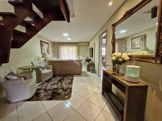 Casa / Sobrado para Venda em Porto Alegre/RS Vila Jardim 4 Quartos