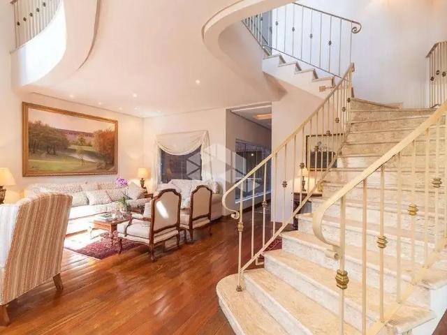 Casa / Sobrado para Venda em Porto Alegre/RS Vila Jardim 4 Quartos
