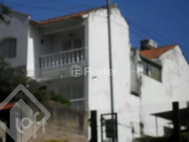 Casa / Sobrado para Venda em Porto Alegre/RS Vila Jardim 4 Quartos