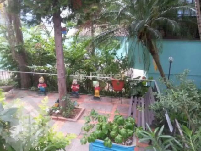 Casa / Sobrado para Venda em Porto Alegre/RS Vila Jardim 4 Quartos
