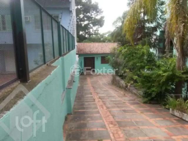 Casa / Sobrado para Venda em Porto Alegre/RS Vila Jardim 4 Quartos