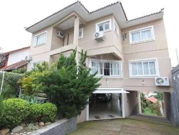 Casa / Sobrado para Venda em Porto Alegre/RS Vila Jardim 4 Quartos