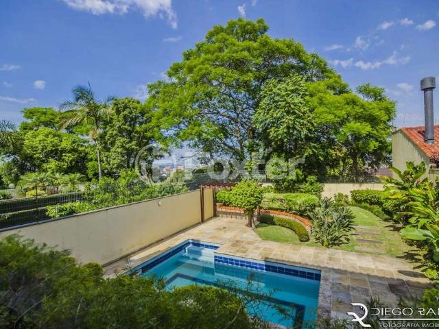 Casa / Sobrado para Venda em Porto Alegre/RS Vila Jardim 5 Quartos