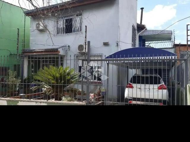 Casa / Sobrado para Venda em Porto Alegre/RS Vila João Pessoa 4 Quartos