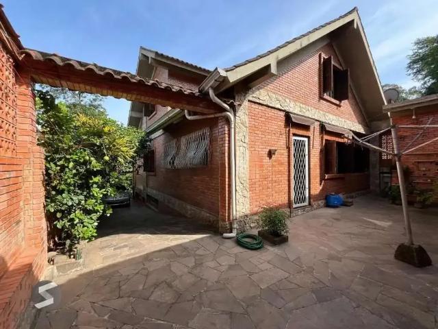 Casa / Sobrado para Venda em Porto Alegre/RS Belém Velho 4 Quartos
