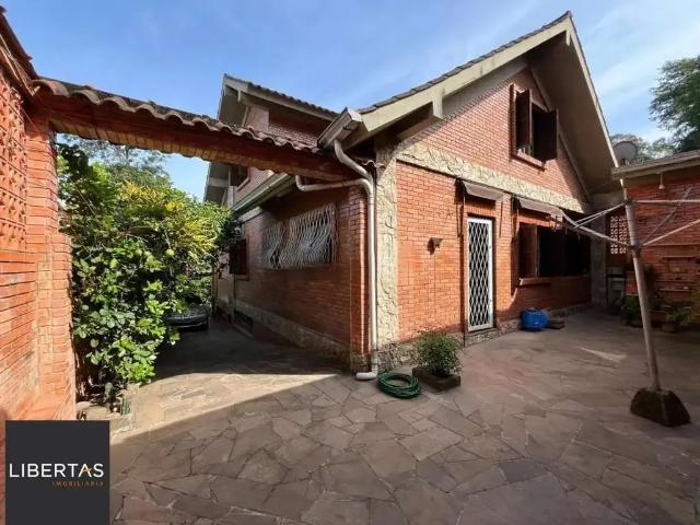 Casa / Sobrado para Venda em Porto Alegre/RS Belém Velho 4 Quartos
