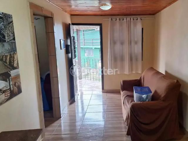 Casa / Sobrado para Venda em Porto Alegre/RS Belém Velho 4 Quartos