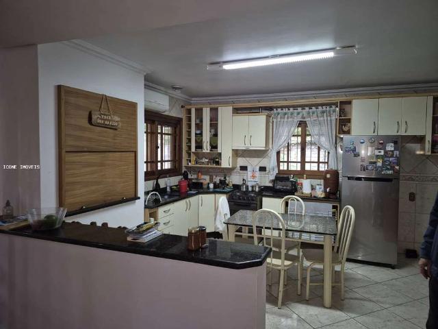 Casa / Sobrado para Venda em Porto Alegre/RS Belém Velho 3 Quartos