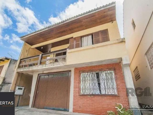 Casa / Sobrado para Venda em Porto Alegre/RS Cascata 4 Quartos