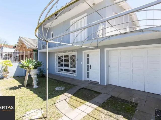 Casa / Sobrado para Venda em Porto Alegre/RS Cavalhada 3 Quartos